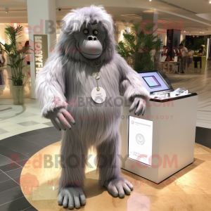 Silver Orangutan mascot costume character dressed with a Shorts and Bracelet watches