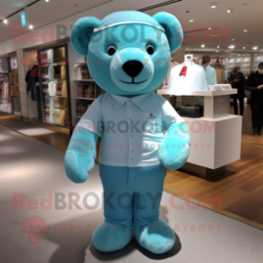 Cyan Teddy Bear mascot costume character dressed with a Polo Tee and Pocket squares