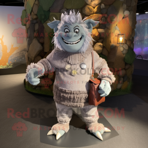 Silver Ogre mascot costume character dressed with a Sweater and Handbags