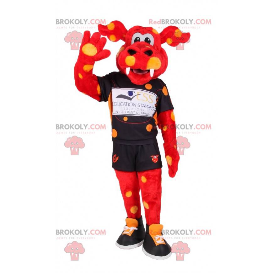 Mascotte rood rundvlees met gele stippen in sportkleding -