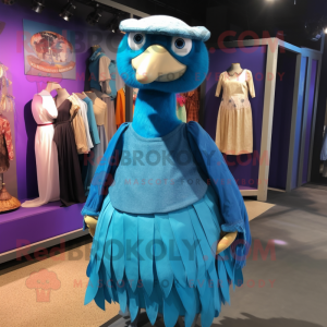Blue Dodo Bird mascot costume character dressed with a Empire Waist Dress and Beanies