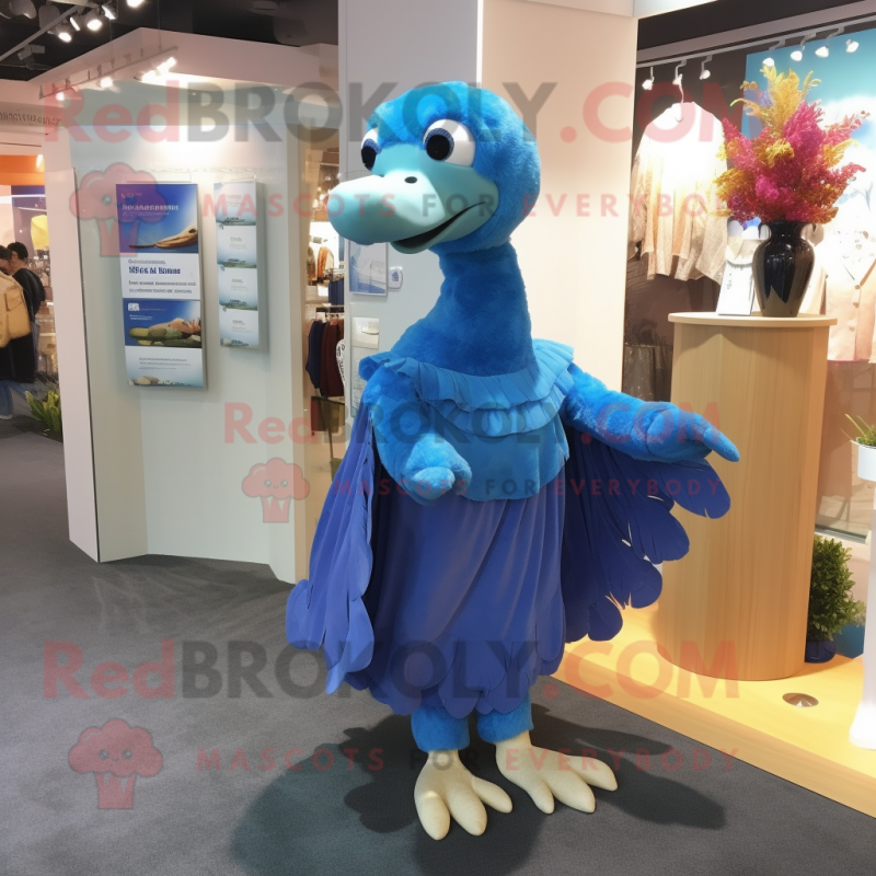 Blue Dodo Bird mascot costume character dressed with a Empire Waist Dress and Beanies Blue Dodo Bird mascot costume character dressed with a Empire Waist Dress and Beanies