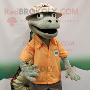 Peach Crocodile mascot costume character dressed with a Button-Up Shirt and Hats