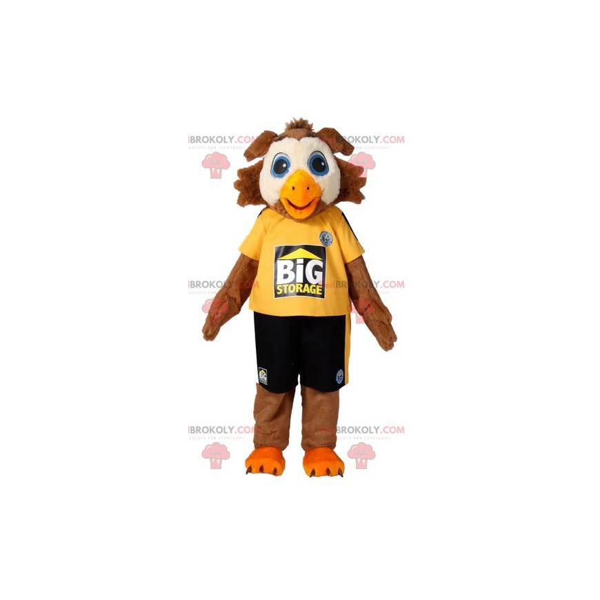 Mascotte d'aigle marron en tenue de sport. Costume d'aigle -