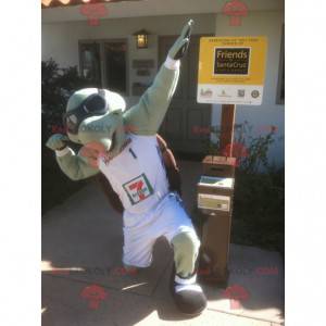 Green and brown turtle mascot with aviator glasses -