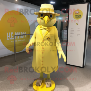 Lemon Yellow Hawk mascot costume character dressed with a Sheath Dress and Hat pins