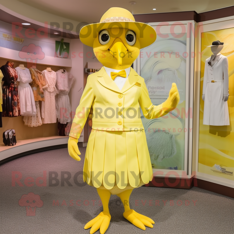 Lemon Yellow Hawk mascot costume character dressed with a Sheath Dress and Hat pins