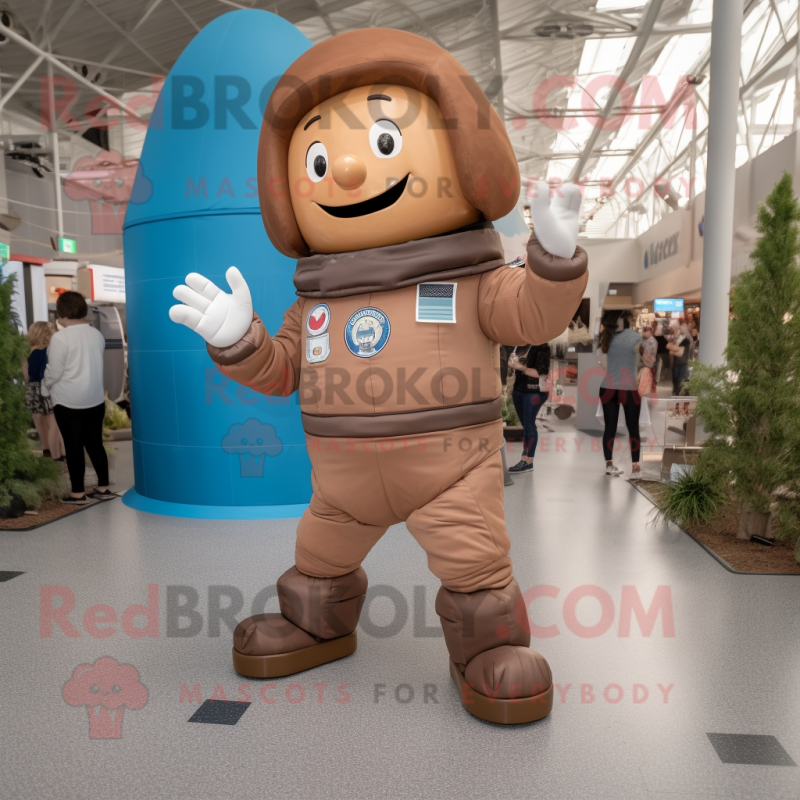 Brown Astronaut mascot costume character dressed with a Chambray Shirt and Foot pads