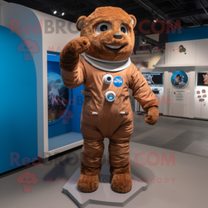 Brown Astronaut mascot costume character dressed with a Chambray Shirt and Foot pads