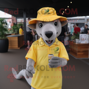 Lemon Yellow Thylacosmilus mascot costume character dressed with a V-Neck Tee and Hats