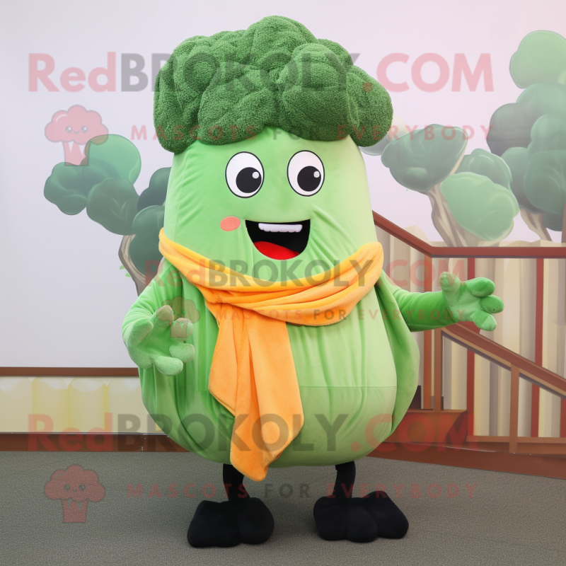 Peach Broccoli mascot costume character dressed with a Sweater and Scarf clips