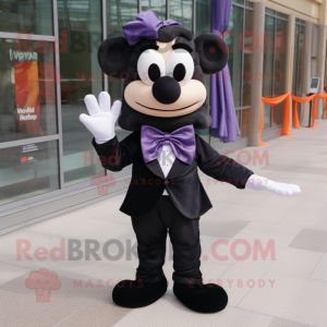 Black Moussaka mascot costume character dressed with a Romper and Bow ties