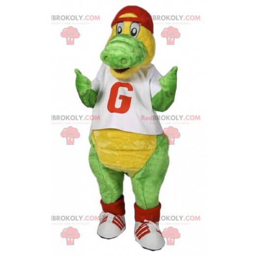 Mascote do dinossauro verde com uma tampa vermelha. -