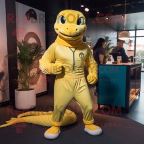 Yellow Anaconda mascot costume character dressed with a Joggers and Brooches