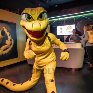 Yellow Anaconda mascot costume character dressed with a Joggers and Brooches