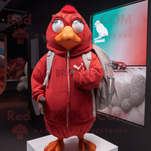 Red Dove mascot costume character dressed with a Hoodie and Backpacks