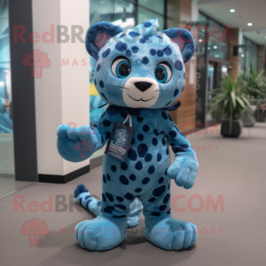 Blue Leopard mascot costume character dressed with a Romper and Messenger bags