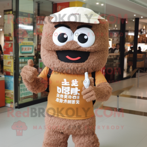Brown Fried Rice mascot costume character dressed with a Polo Tee and Rings