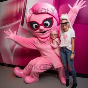 Pink Contortionist mascot costume character dressed with a Mom Jeans and Sunglasses