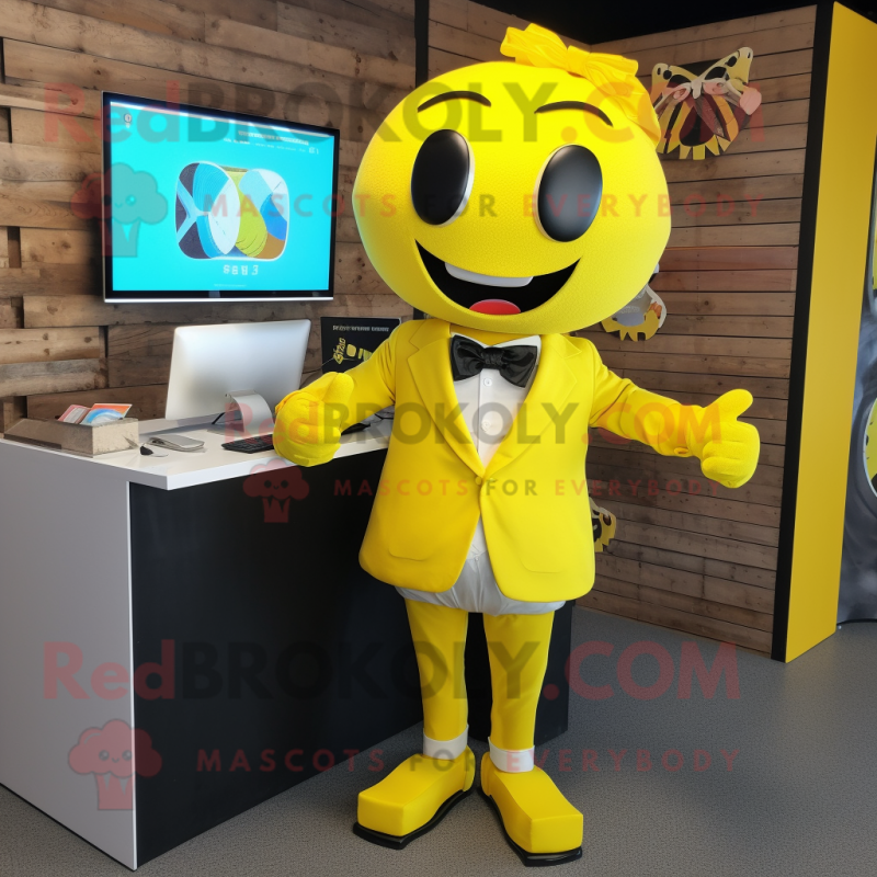 Yellow Computer mascot costume character dressed with a Suit Jacket and Bow ties