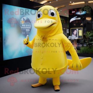 Yellow Humpback Whale mascot costume character dressed with a Dress and Digital watches