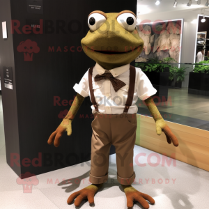 Brown Frog mascot costume character dressed with a Oxford Shirt and Shoe clips