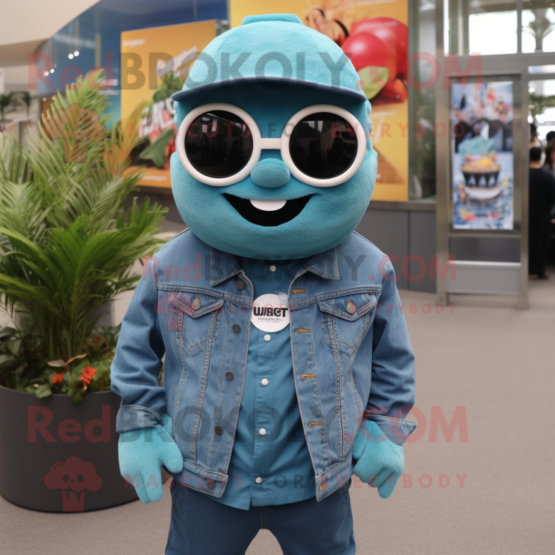 Teal Cod mascot costume character dressed with a Denim Shirt and Sunglasses