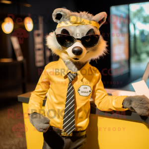 Gold Badger mascot costume character dressed with a Graphic Tee and Tie pins