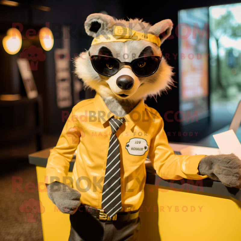 Gold Badger mascot costume character dressed with a Graphic Tee and Tie pins Gold Badger mascot costume character dressed with a Graphic Tee and Tie pins