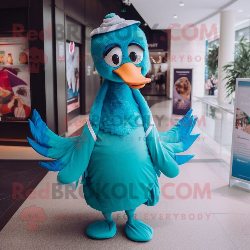 Turquoise Swan mascot costume character dressed with a Cover-up and Anklets