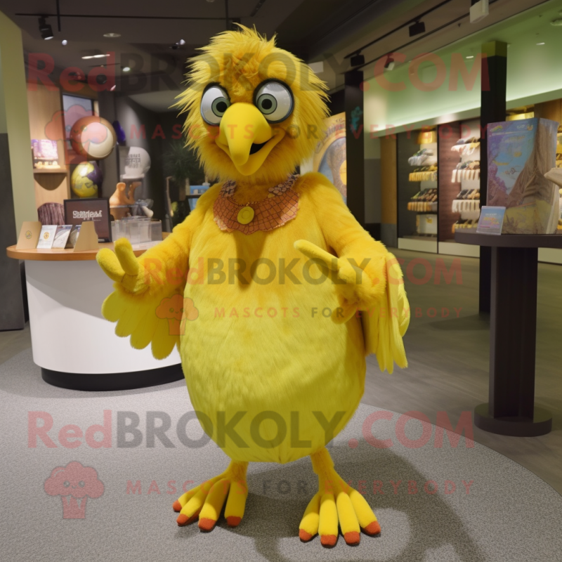 Yellow Harpy mascot costume character dressed with a Cardigan and Coin purses