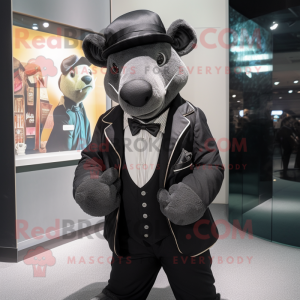 Black Tapir mascot costume character dressed with a Blazer and Berets