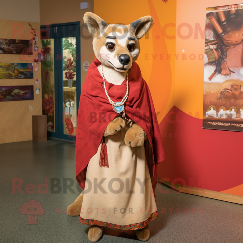 Tan Dingo mascot costume character dressed with a Wrap Skirt and Shawls