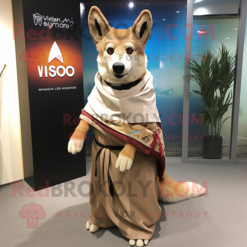 Tan Dingo mascot costume character dressed with a Wrap Skirt and Shawls