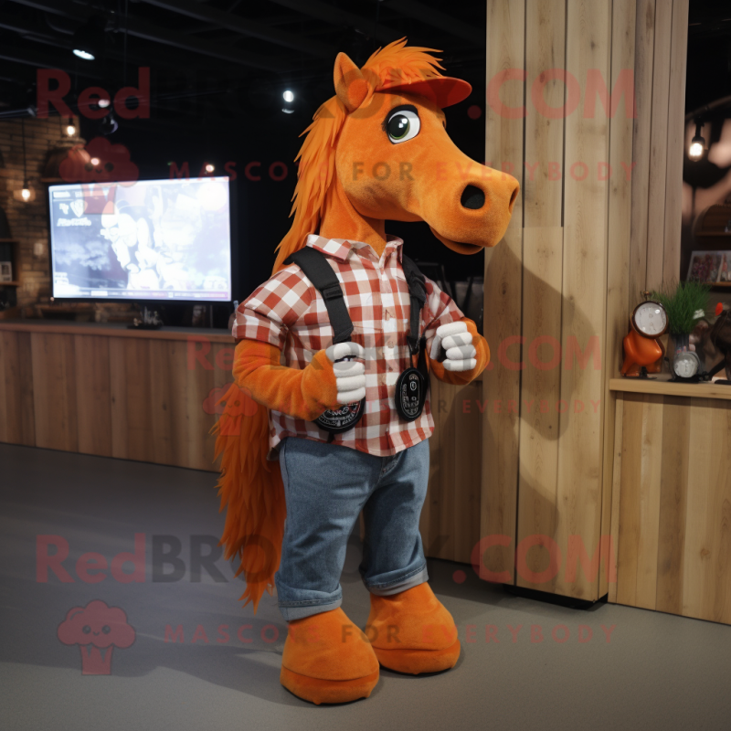 Orange Horse mascot costume character dressed with a Flannel Shirt and Smartwatches