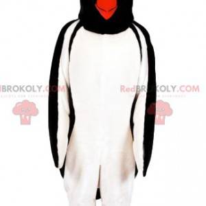 Mascote pinguim com uma folhada amarela. - Redbrokoly.com