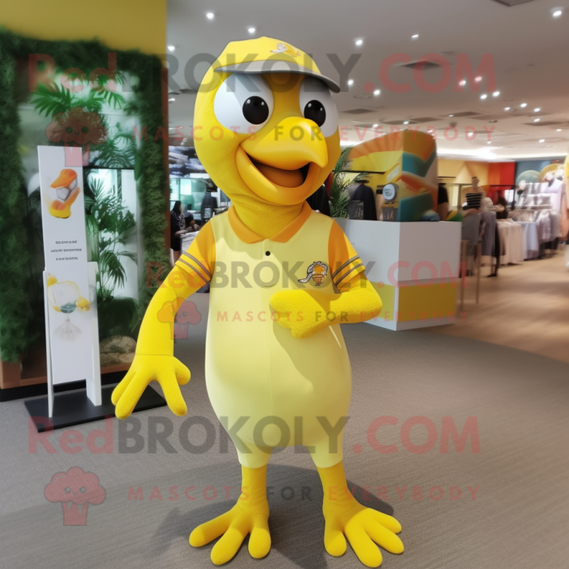 Lemon Yellow Woodpecker mascot costume character dressed with a Polo Tee and Rings Lemon Yellow Woodpecker mascot costume character dressed with a Polo Tee and Rings