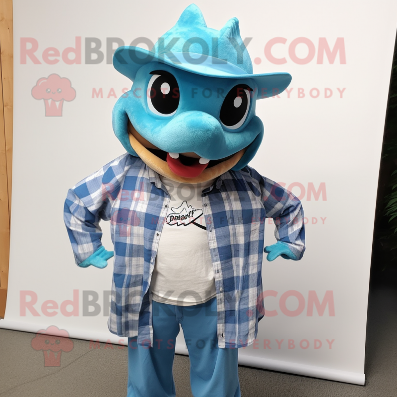 Cyan Manta Ray mascot costume character dressed with a Flannel Shirt and Hat pins