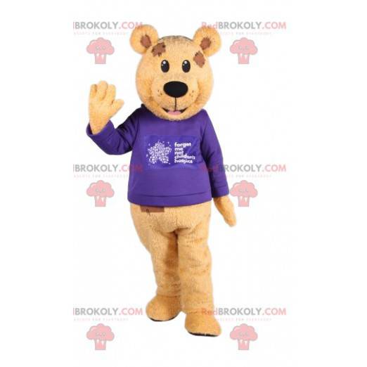 Brown bear mascot with a blue jersey. Bear costume -