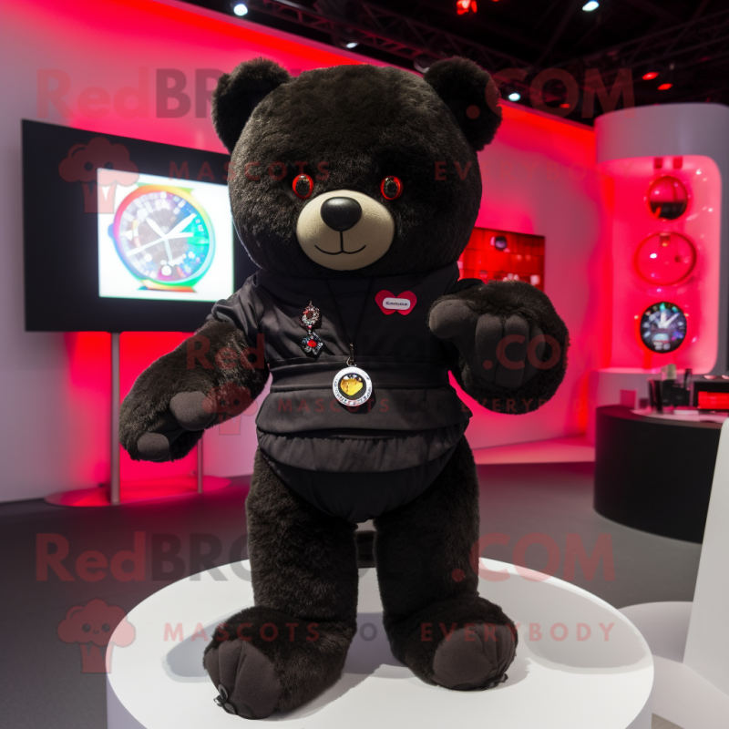 Black Teddy Bear mascot costume character dressed with a Vest and Smartwatches Black Teddy Bear mascot costume character dressed with a Vest and Smartwatches