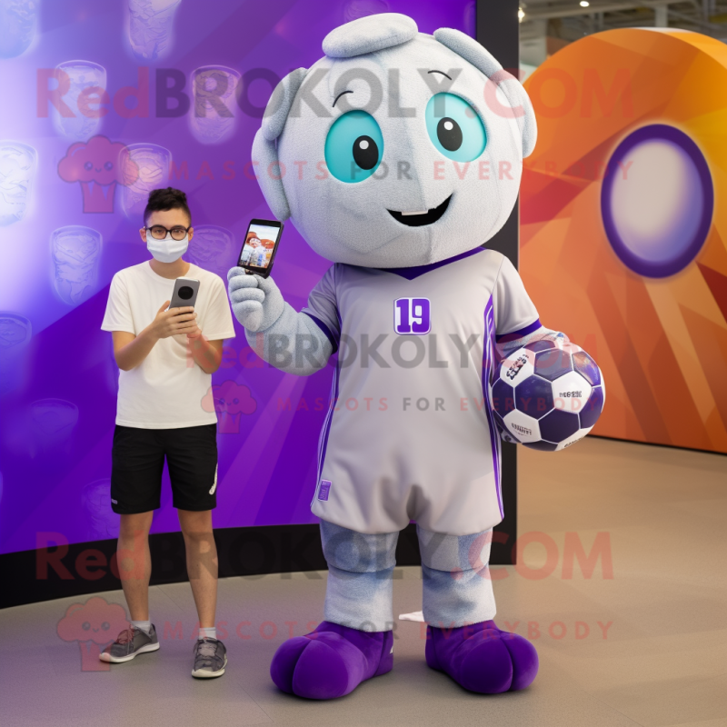 Lavender Soccer Ball mascot costume character dressed with a Graphic Tee and Smartwatches