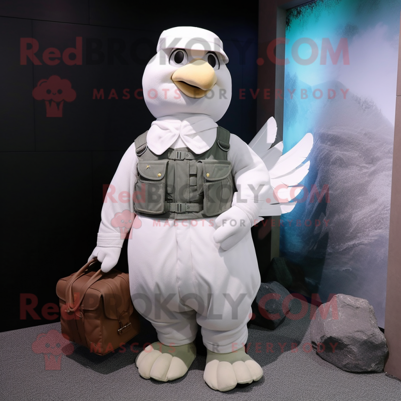 White Dove mascot costume character dressed with a Cargo Pants and Mittens