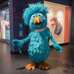 Turquoise Harpy mascot costume character dressed with a Ball Gown and Beanies