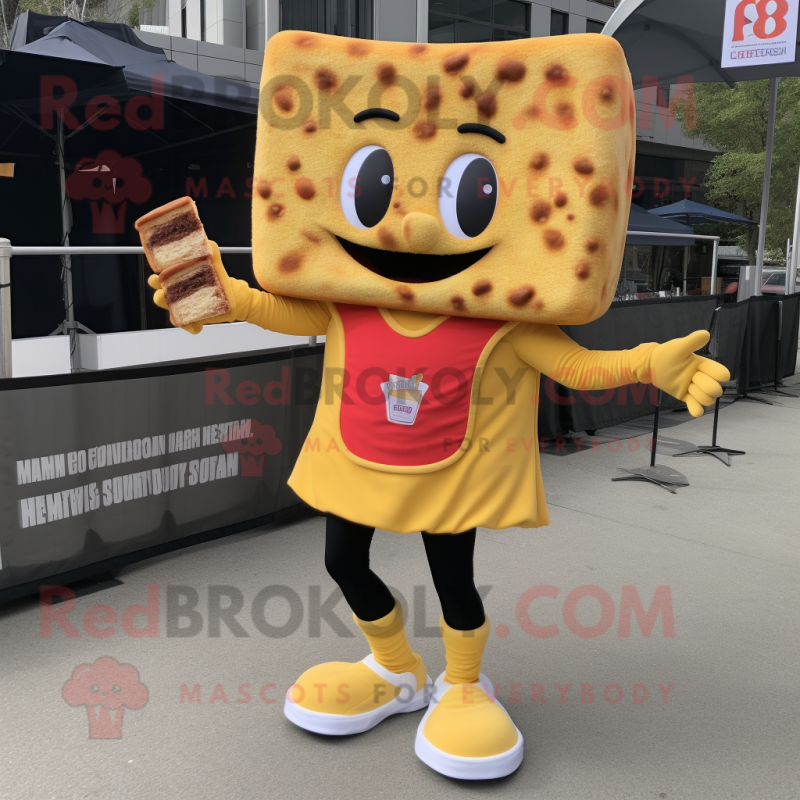 Gold Grilled Cheese Sandwich mascot costume character dressed with a Joggers and Shoe clips Gold Grilled Cheese Sandwich mascot costume character dressed with a Joggers and Shoe clips