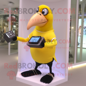 Lemon Yellow Toucan mascot costume character dressed with a Leggings and Bracelet watches