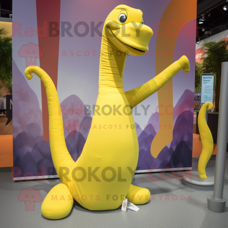 Yellow Brachiosaurus mascot costume character dressed with a Yoga Pants and Caps Yellow Brachiosaurus mascot costume character dressed with a Yoga Pants and Caps