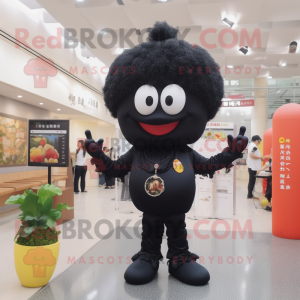Black Fried Rice mascot costume character dressed with a Jeggings and Earrings