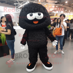 Black Fried Rice mascot costume character dressed with a Jeggings and Earrings