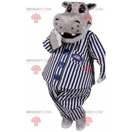 Grijze hyppotamus mascotte in gestreepte pyjama. -