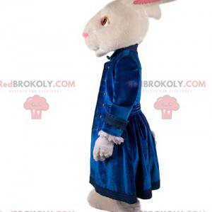 Weißes Kaninchenmaskottchen mit blauer Samtjacke -